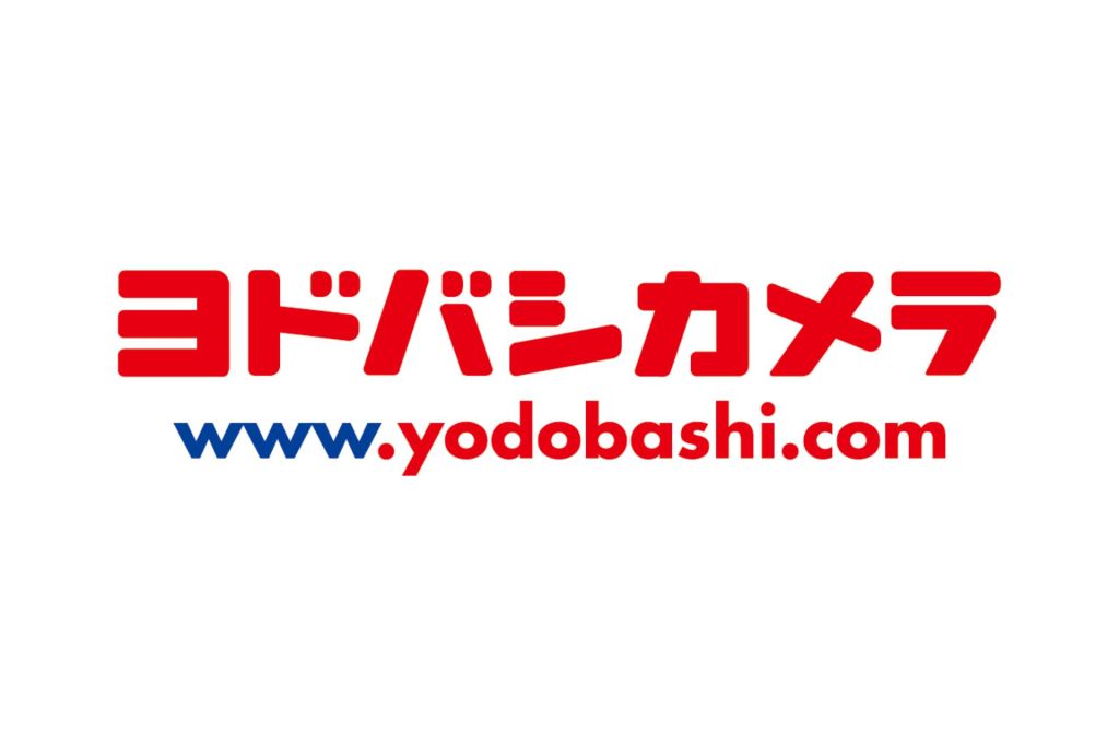 Yodobashi Camera logo: red Japanese text with 'www.yodobashi.com' in blue and red.